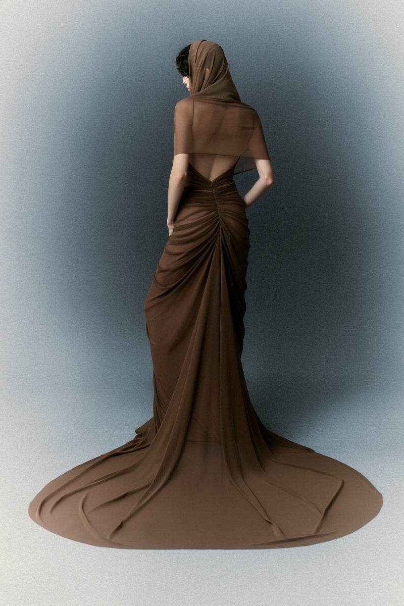 White Plan Margaret gown displayed on a hanger featuring elegant fabric and detailed design perfect for formal occasions