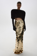 Gold sequined maxi skirt by Balykina featuring shimmering fabric and a flowing length, perfect for elegant evening wear.