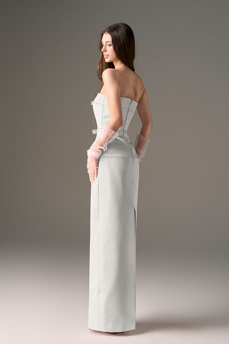 Light gray CULT MIA X I.H.F Studio Taffeta maxi dress with a fitted column silhouette and elegant flowy design.