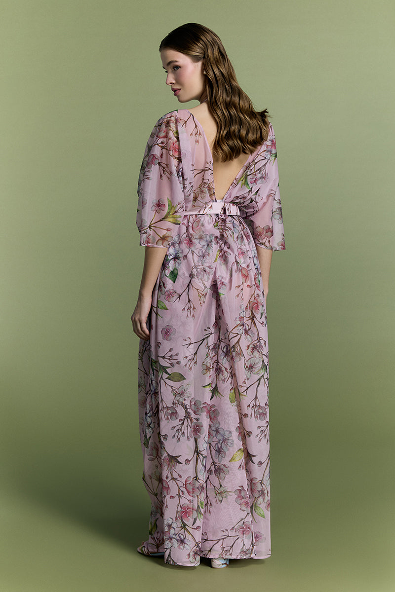 Nur Karaata Island Mirage cover-up displayed on a model, lightweight fabric with tropical print perfect for beachwear.
