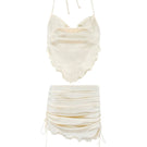White pearl ALESSIA co-ords set by Suncillo, featuring a stylish matching top and pants with pearl details.