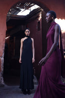 Black Baobab ARI Maxi Dress featuring a flowing silhouette and elegant design, perfect for casual or formal occasions.
