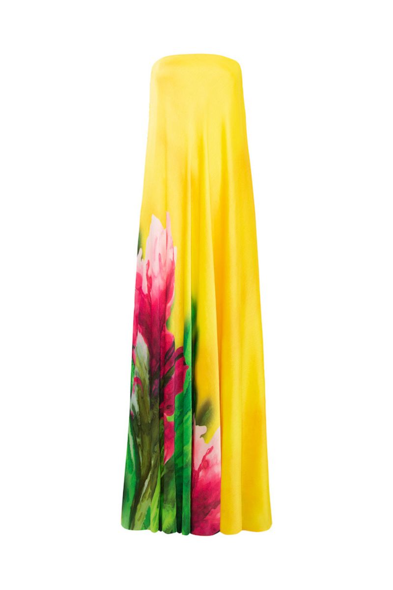 Sisters peony dress in bold blossom print, a stylish maxi dress with vibrant floral pattern and flowing fabric.