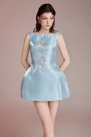 Blue Aurora mini dress by Do Long featuring a sleek, fitted silhouette with short sleeves and a stylish neckline.