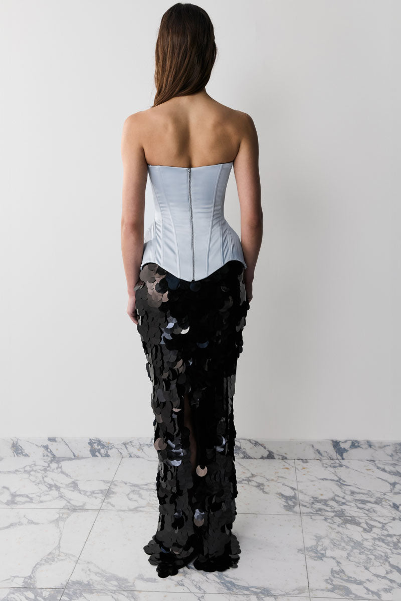 Light-blue Irma Balykina corset top with lace-up front and structured design, displayed on a plain background.