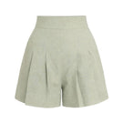 ANA + MARIA Amelie shorts in Aloe Wash, showing lightweight denim shorts with frayed hems and a relaxed fit.