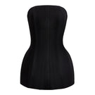 Black strapless crepe top from CEM, lightweight and stylish, shown on a model with a fitted silhouette and minimal detailing.