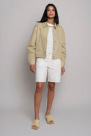 TT Studios Duke white shorts laid flat, showcasing the relaxed fit and clean design of these stylish men's shorts.