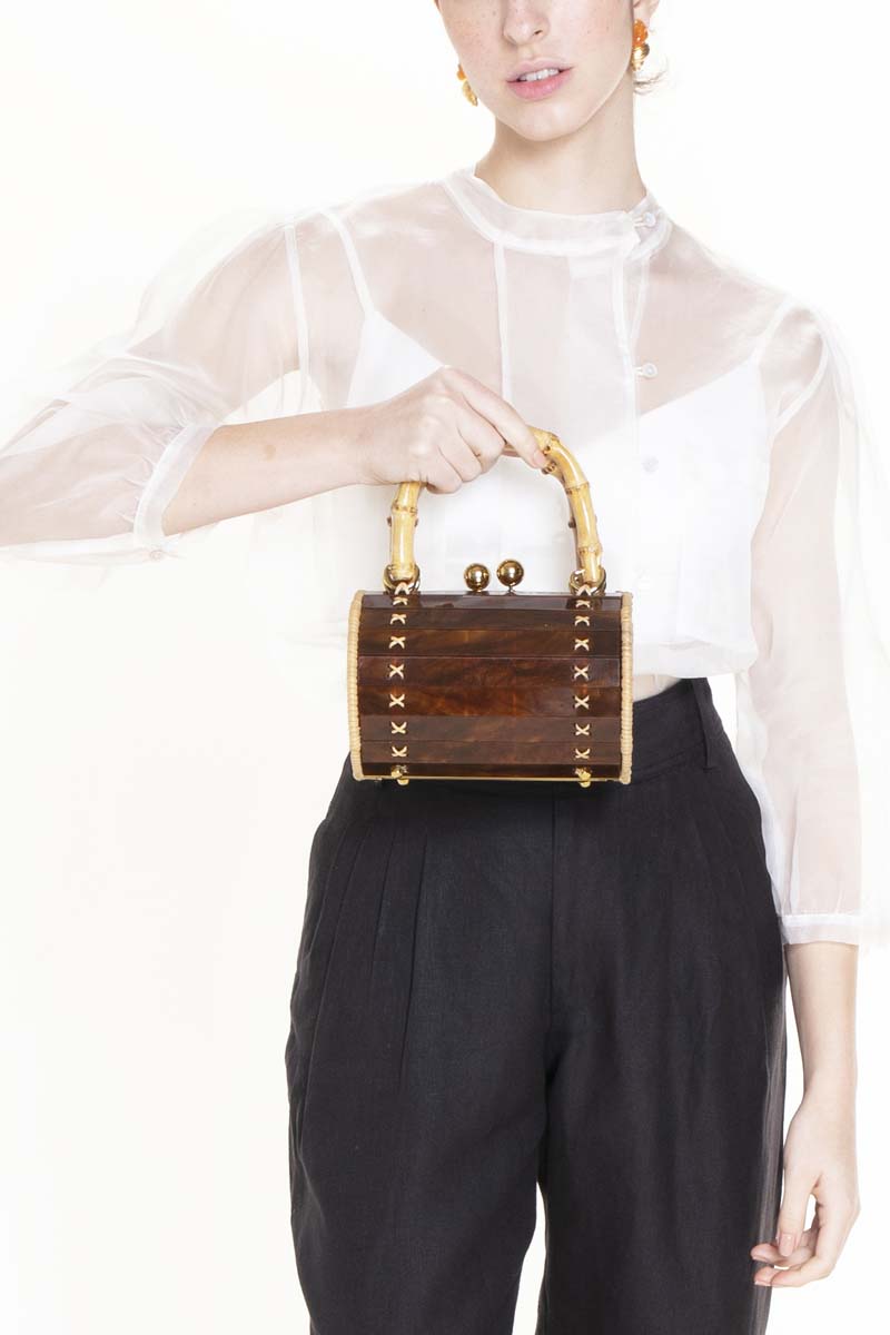 Waiwai Rio Alix Bambu Turtle top handle bag with bamboo accents and eco-friendly design, featuring a structured shape and natural finish.