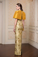 Yellow sleeveless floral gown with round neck by I.H.F, featuring a vibrant floral print on lightweight fabric.