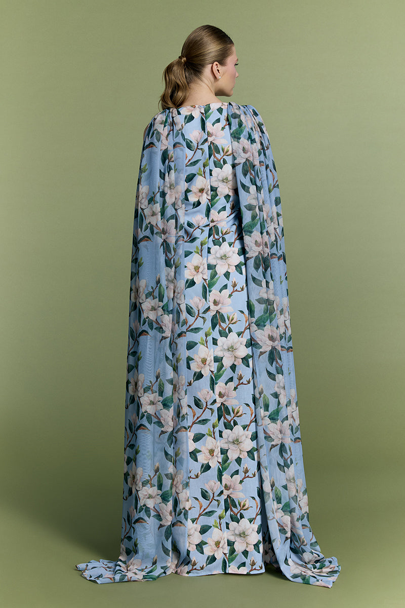 Nur Karaata Whisper Wind gown featuring flowing fabric, elegant design, and intricate details ideal for formal occasions.