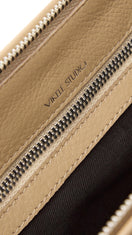 VIKELE STUDIO Denise mini beige shoulder bag with adjustable strap and sleek design, perfect for casual or evening outings.