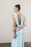 Nazlı Ceren Vivienne long jersey dress in baby blue, featuring a flowing maxi dress design with a soft, elegant fabric.