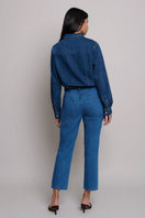 DARYL JEAN IN MAIN ST. by TT Studios, blue denim jeans with classic fit and stylish design, displayed on a hanger.