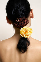 Luxurious Tuscan Rose silk scrunchies from Not Just Pajama, soft hair accessories with a smooth, shiny silk finish.