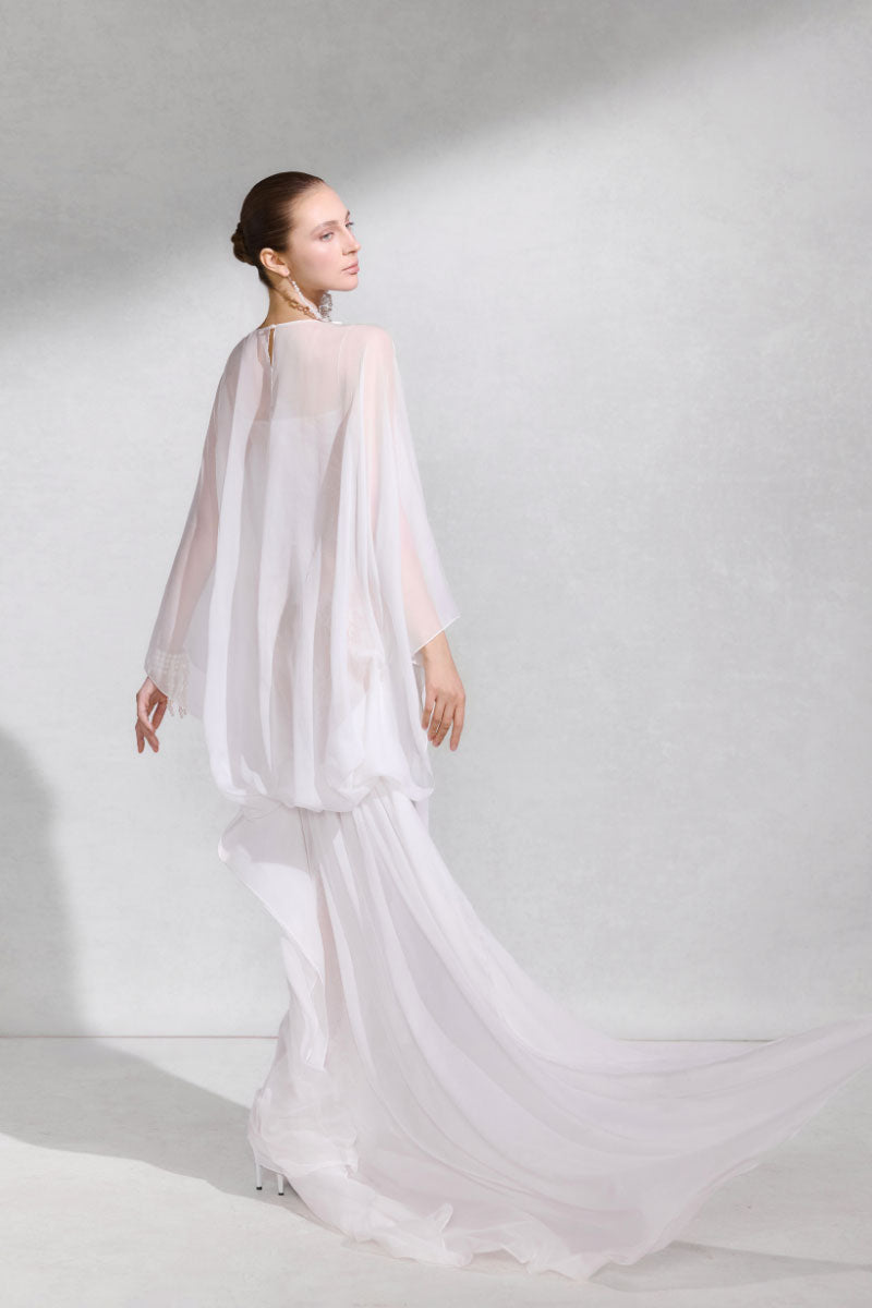 Elegant Arti Apparel GENUS maxi dress featuring a flowing fabric and stylish design, perfect for casual or formal occasions.