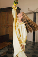 Brown silk custom gown robe from Not Just Pajama, featuring a smooth, luxurious fabric and elegant design.