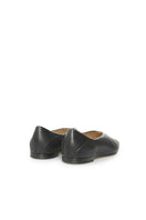 Black flats by Vikele Studio with a sleek, minimalist design, featuring a smooth finish and comfortable flat sole.