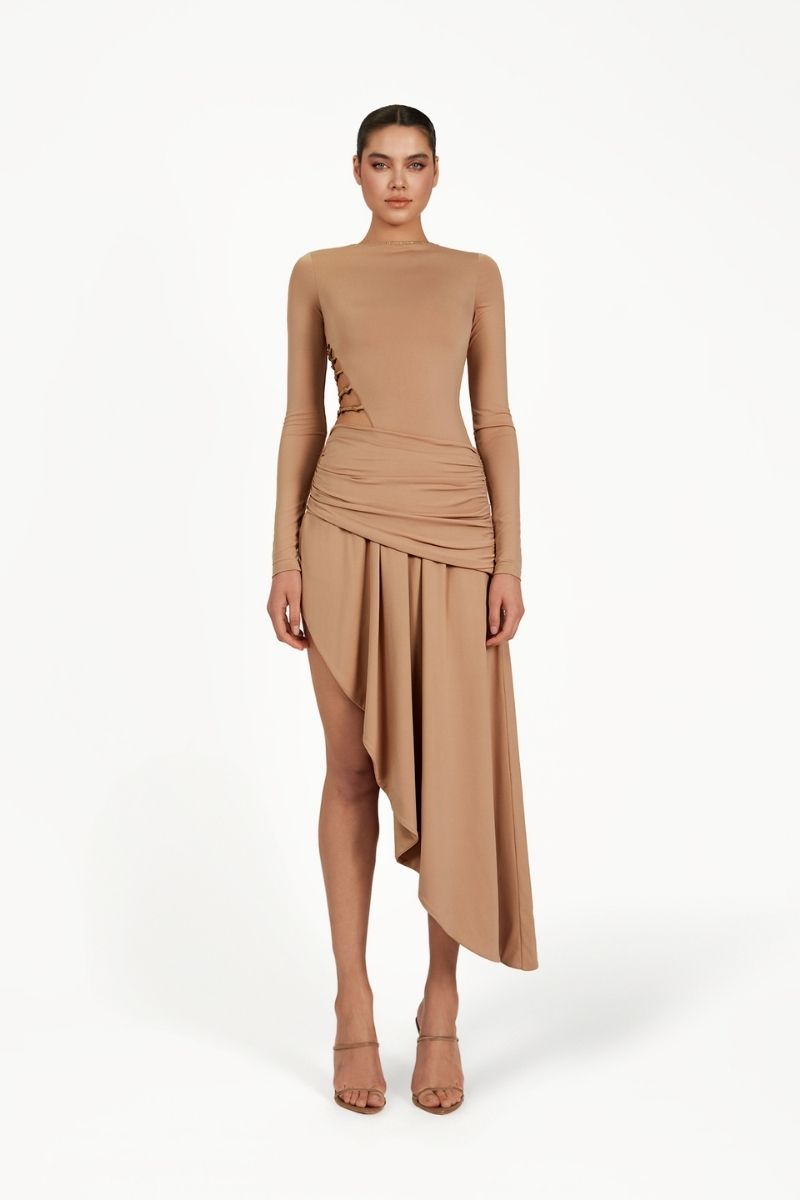 Khanum's Kasmina tan mini dress displayed on a hanger with a simple background, showcasing its fitted style and sleeveless design.