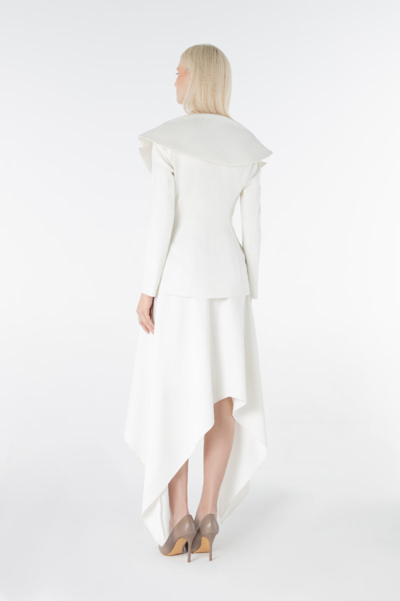 Lili Blanc crepe blazer in black, tailored fit with notched lapels and long sleeves, displayed on a hanger.