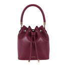 Saonara Berry Bucket Top Handle Bag showing a stylish round bag with top handle and textured berry design.
