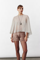 Nazlı Ceren smoked gray chiffon cape jacket displayed on a hanger with flowing fabric and elegant design.