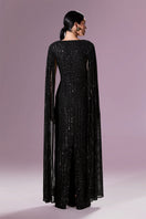 Nur Karaata Giovana gown featuring elegant fabric and intricate design, perfect for formal occasions.