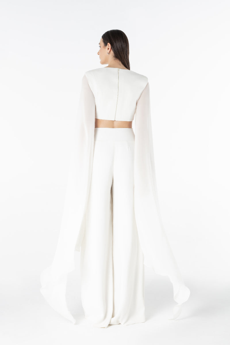 Lili Blanc sculpted wide trousers in lightweight fabric, featuring a high waist and relaxed fit, displayed on a neutral background.