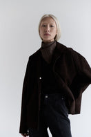 ZUT Meydan suede jacket with a classic collar, front zipper, and stylish design, shown in a close-up of the brown suede material.