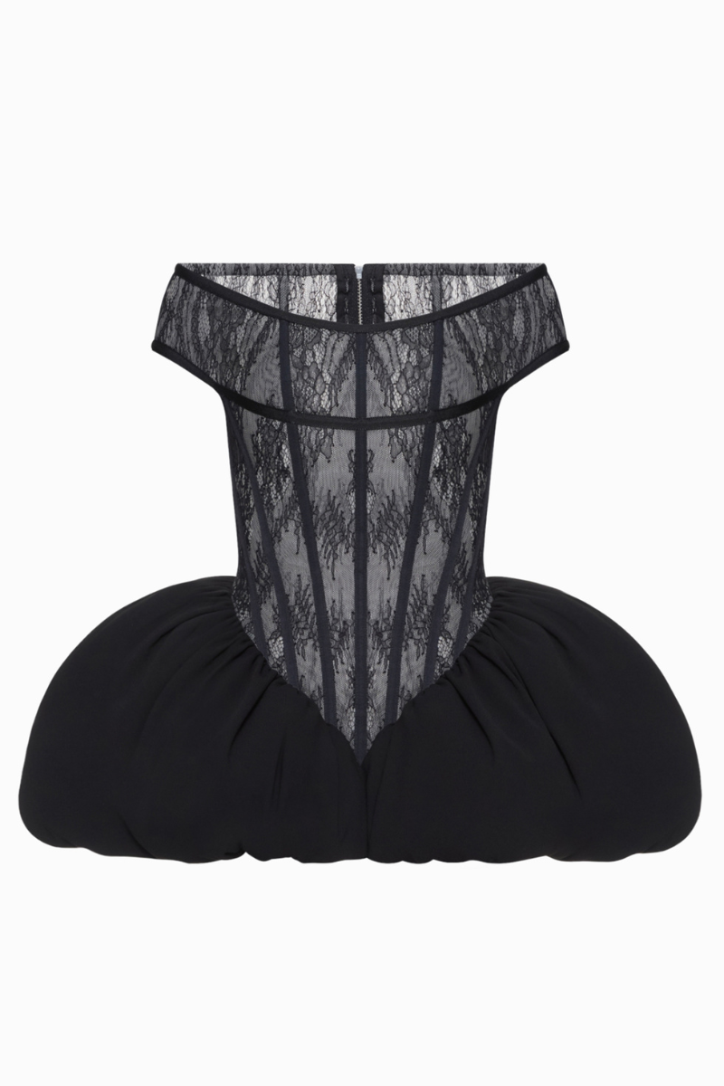 Black THEA mini dress by BALYKINA, featuring a fitted silhouette and stylish design, shown on a model.