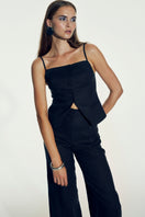 Nazlı Ceren Millie linen trousers in dark navy, tailored pants with a relaxed fit and sleek waistband, styled for casual or office wear.
