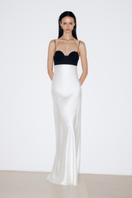 Elegant ivory silk gown with a black top from ELENAREVA, featuring a flowing design and stylish contrast detail.