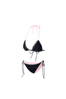Reversible pink and black bikini set by Suncillo with triangle top and matching bottoms, displayed on a white background.