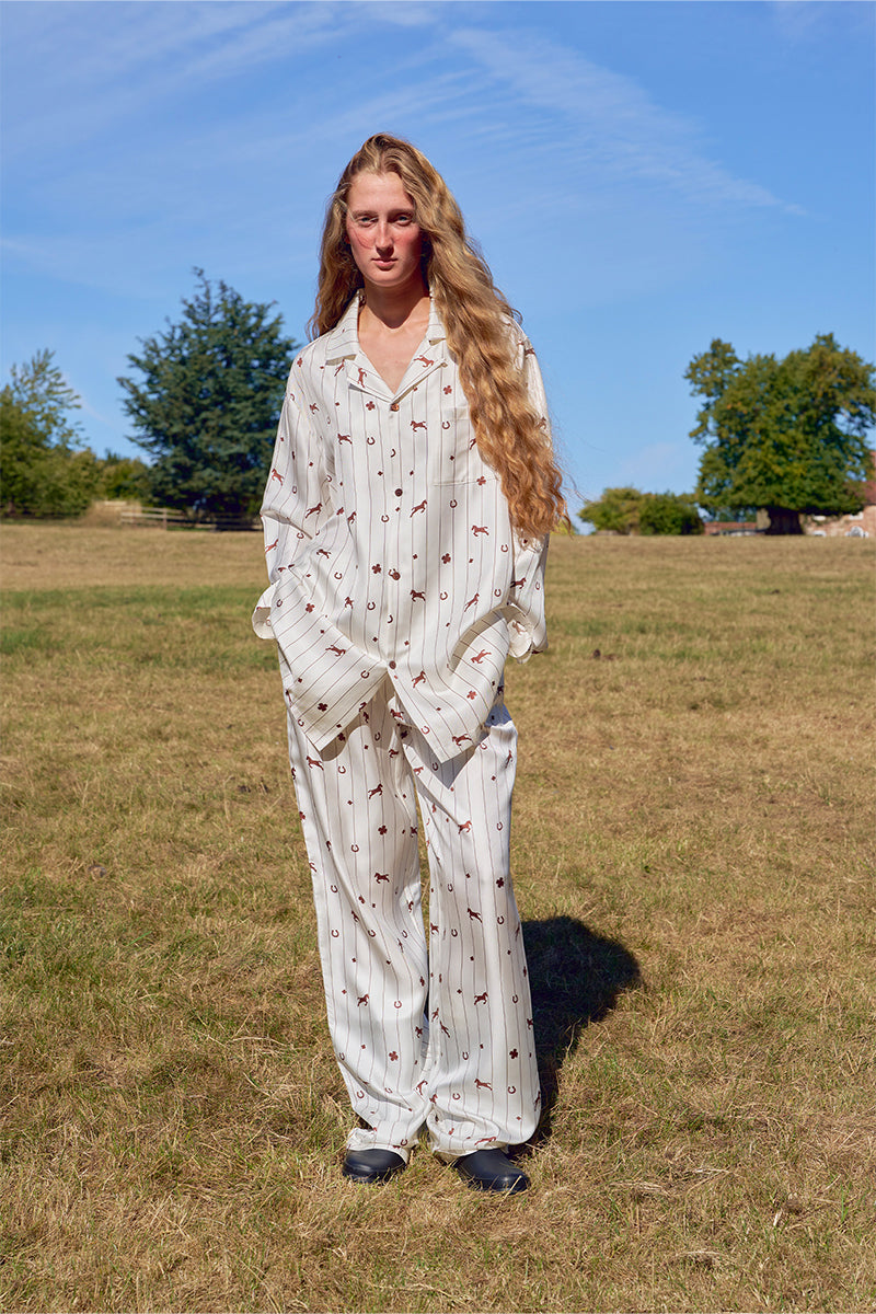 Unisex brown printed twill pajama set with long sleeves and pants, featuring a relaxed fit and comfortable fabric.