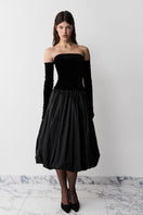 Black Transformer midi skirt by Balykina, featuring a stylish, fitted design with a sleek fabric finish and versatile length.