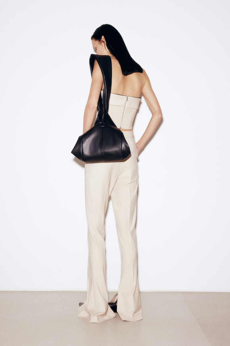 Beige wool mini corset top by ELENAREVA featuring a fitted design and structured silhouette.