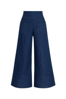 Dark blue button pants from ANA + MARIA featuring a tailored fit and classic design, shown on a model.