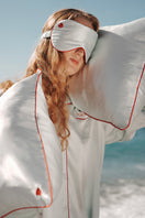 Blue Little Heart Eye Mask from Not Just Pajama, soft loungewear accessory with heart-shaped eye openings for comfortable relaxation.