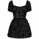 Black Mirabelle tulle dress by 21Six, showcasing a stylish mini dress with delicate tulle fabric and elegant design.