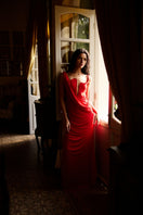 Deme By Gabriella Adriana Red Maxi Dress with flowing fabric and sleeveless design, perfect for elegant occasions.