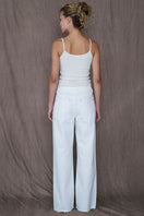 White Audrey Jean by TT Studios featuring classic denim style, high-waisted fit, and subtle stitching details.