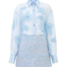 Blue shiny silk floral co-ord set by 21Six featuring a stylish shirt and matching skirt for elegant wear.
