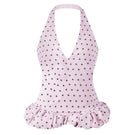 Stolen Stores purple polka dot mini crop top with long sleeves, featuring a trendy Kapi design and stylish fit.