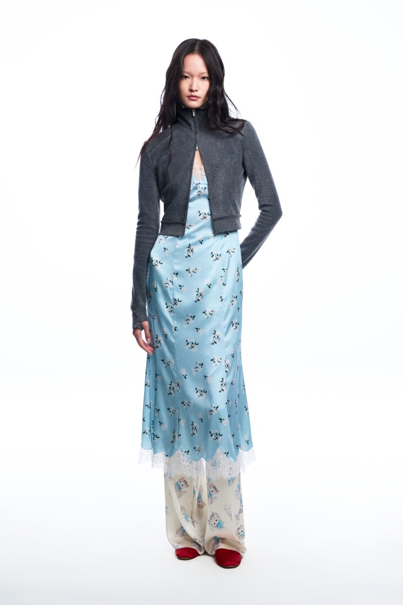 Chictopia floral slip midi dress with a fitted bodice, flowy skirt, and vibrant floral pattern on lightweight fabric.