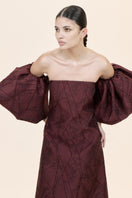 Nihan Peker Mustesna gown featuring elegant fabric and detailed design, perfect for formal occasions.