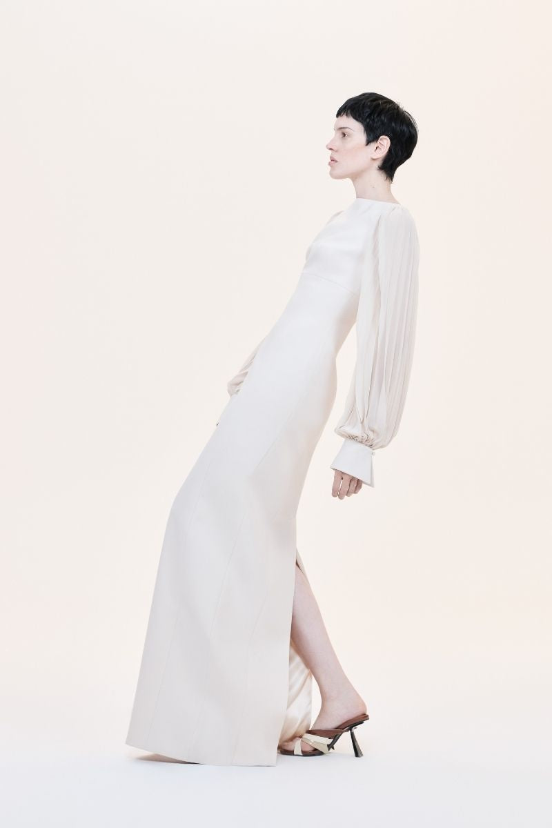 Nihan Peker NAVİGLİ gown featuring elegant flowy fabric and intricate detailing, perfect for formal occasions.
