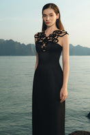 Elegant black LYCRA taffeta gown by Lune De Soie featuring a flowing silhouette and classic design, perfect for formal occasions.