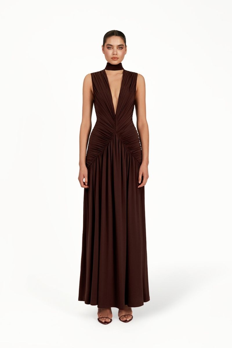 KUBAYMA brown maxi dress by Khanum's featuring flowing fabric and elegant design, perfect for casual or formal occasions.