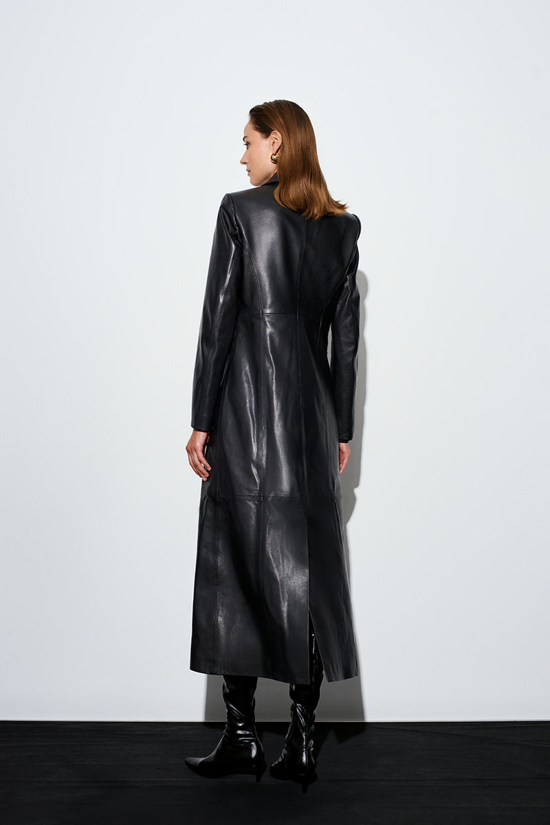Black Venus Maxi Blazer by Acaria Studio, displayed on a hanger, showcasing its tailored fit and sleek design.