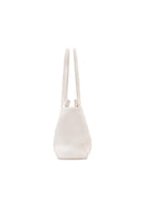 Off-white Vikele Studio tote bag with shoulder strap, spacious and stylish, shown in a close-up image of the bag’s material and design.